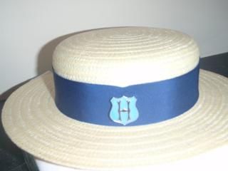Helvetia Metal Hat Badge